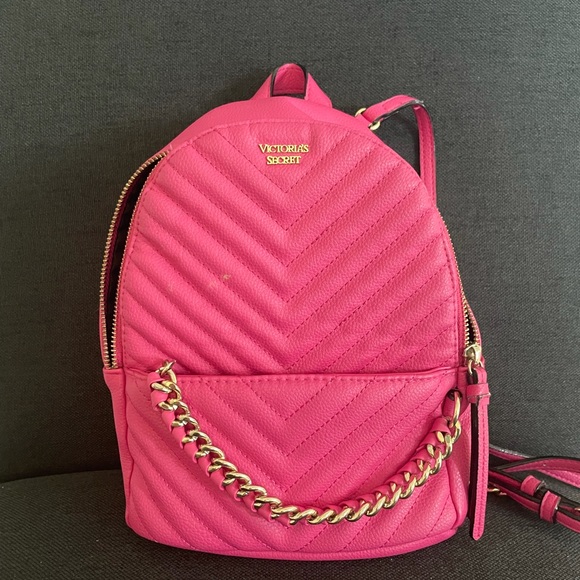 i am selling this hot pink victoria secret mini backpack